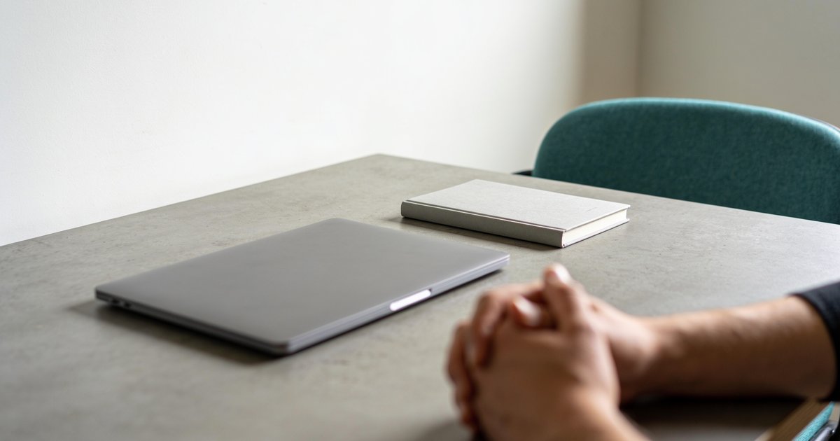 A freelancer's home office workspace, with the laptop closed